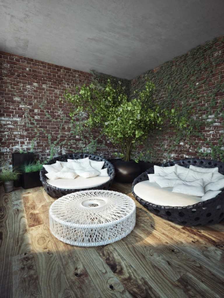 Salónik s tehlovou stenou na balkóne spálne konferenčný stolík s modernou klinkerovou stenou a dizajnom obývačky