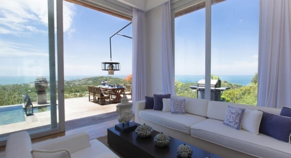 moderná luxusná vila exotický interiér obývacia izba moderná luxusná vila s exotickým interiérom obývacej izby