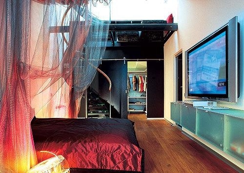 podkrovný byt superhrdinské motívy spálňa penthouse so spálňou s motívmi superhrdinov