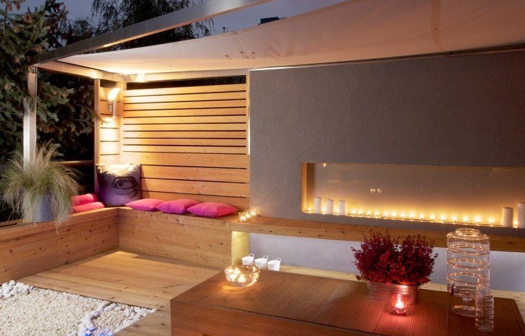moderná terasa s príjemným nočným osvetlením Dizajn terasy a záhrady -moderné-drevené podlahy-lavica-jedálenský stôl-led-čajové svetlá