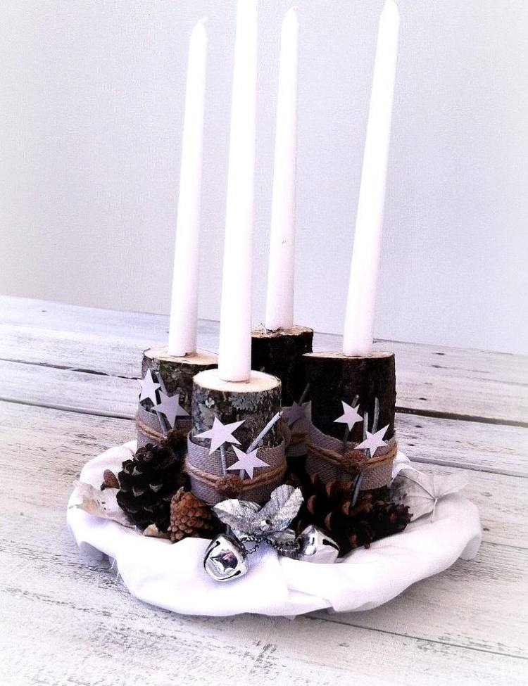 Do taniera naaranžujte svietniky so šiškami adventný veniec-moderný-urob si sám-svietnik-kusy drevených misiek-šišky-deko-biele