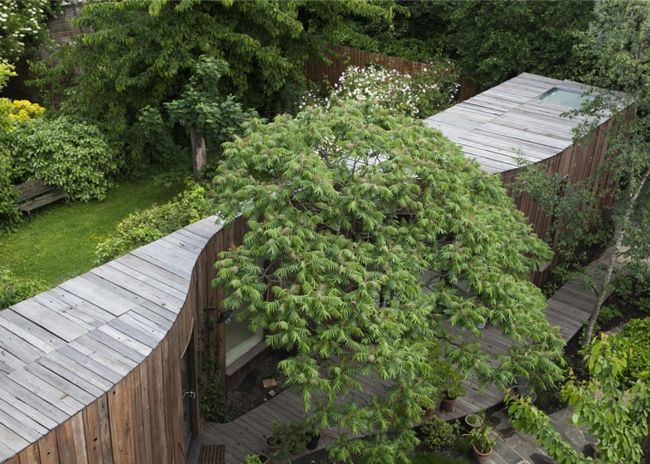 Drevený záhradný domček Anglicko s modernou fasádou Anglicko moderná fasáda jednopodlažná klenutá