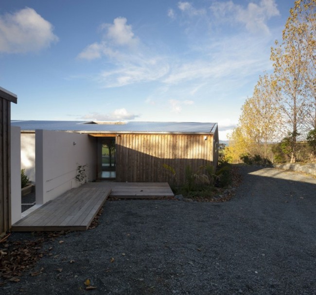 Dom Lande Nový Zéland Drevená terasa Kieselweg Drevený dom Lande Kieselweg drevená terasa moderná fasáda