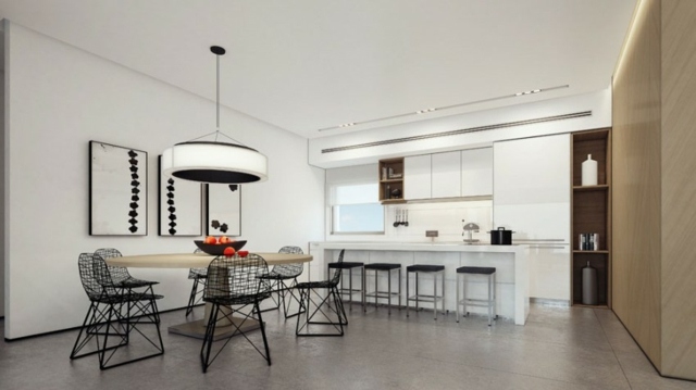 Ideen Esspaltz drevený stôl okolo čiernych kovových stoličiek