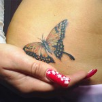 tatuaż motyl dla dziewczynki - nakładany na podbrzusze
