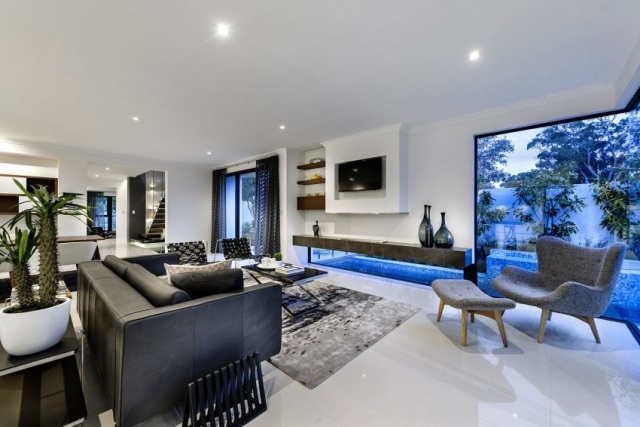 Skupina na sedenie-kožená sedačka-relaxačná stolička-s podnožkou-so vzorom koberca