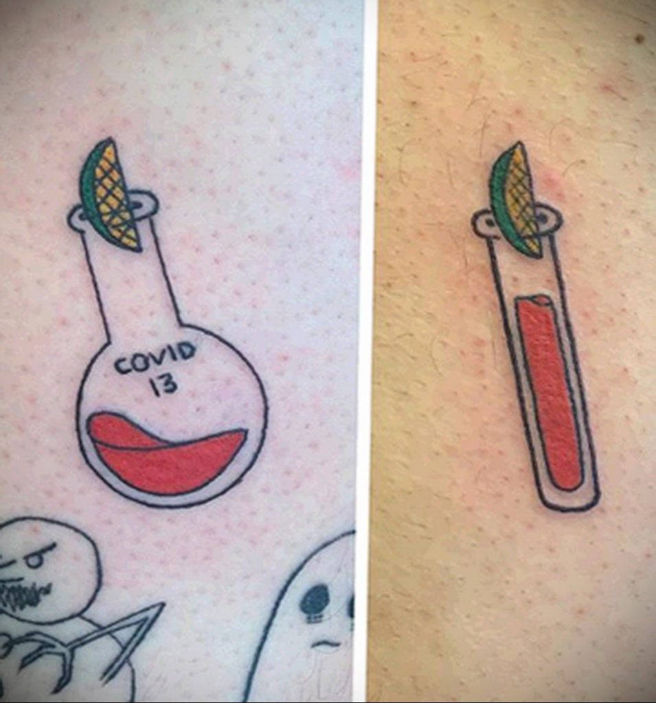 Tetovaža na temu koronavirusa COVID -19 - epruveta s virusom
