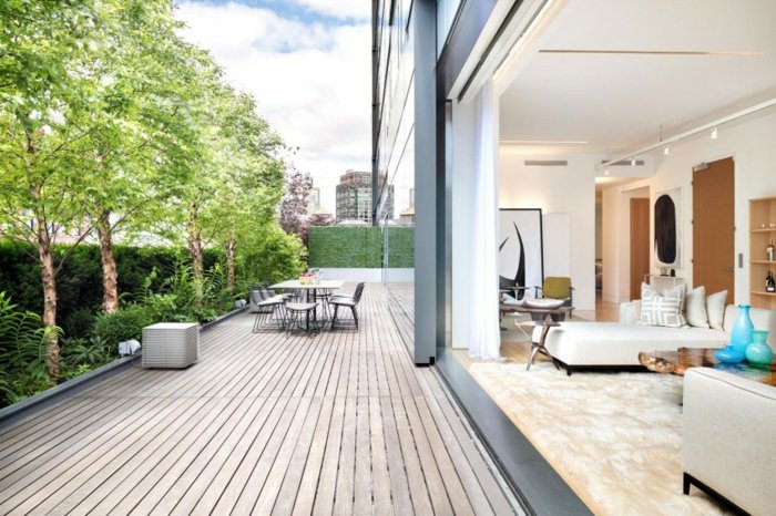 Obývacia izba s posuvnou sklenenou verandou