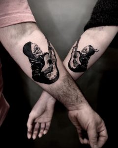 Tatuaż dla par ze szkieletami grającymi na gitarze - zdjęcie 2