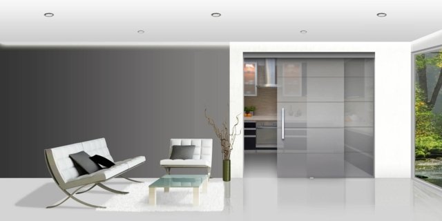 moderná kuchyňa s posuvnými dverami do obývačky ako rozdeľovač miestností Obývacia izba s posuvným sklom a minimalizmom