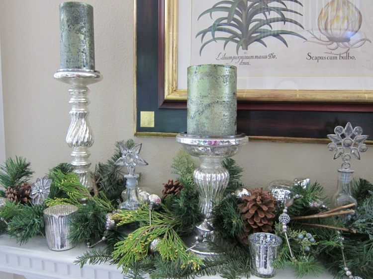 Strieborné svietniky pre romantickú, vianočnú náladu strieborná vianočná ozdoba krbová rímsa svietnik konáre šišky