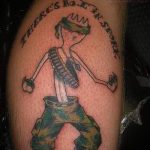 Смешно същество във военна униформа - татуировка