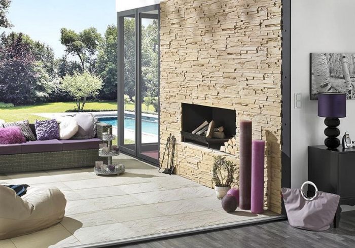 ohnisko v zimnej záhrade s kamenným obkladom kamenná stena-obývačka-klimex-zimná záhrada-krbová vložka