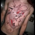 cápa tetoválás a mellkason