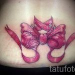 arc tatouage sur le bas du dos - fényképes példa tattoage fini 02052016 1