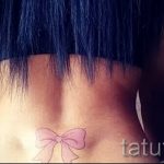 arc tatouage sur le bas du dos - fényképes példa tattoage fini 02052016 2