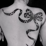 tetoválás íj formájában - Fotó példa a kész tetoválásra 02052016 1