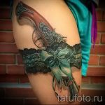 Tattoo -Strumpfband mit einem Bogen auf seinem Bein - Beispielfoto des fertigen Tätowierung 02052016 2