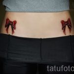 íj tetoválás a hát alsó részén - fotó példa a kész tetoválásra 02052016 4