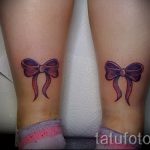 tetováló íjak a lábakon a hátsó fényképen - fotó példa a kész tetoválásra 02052016 17