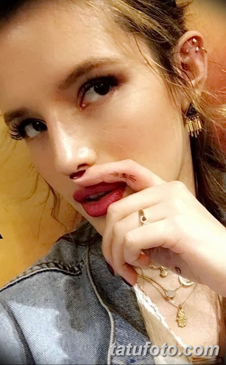 Татуировка Бела Торн - котешки мустак