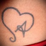 tetoválás a betű formájában - egy fotó a kész tetoválásról - 20122015 № 3