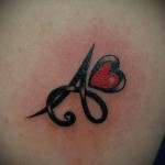 tetoválás a betű formájában - egy fotó a kész tetoválásról - 20122015 № 5