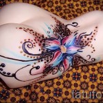 وشم زهرة على أسفل الظهر - خيار الصورة من 21122015 رقم 12