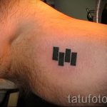 małe tatuaże dla facetów - przykład zdjęcia 3