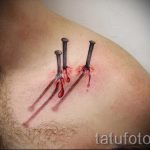 małe tatuaże dla facetów - przykład zdjęcia 7