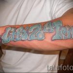 tatuaż na rękę dla facetów - przykład zdjęcia 9