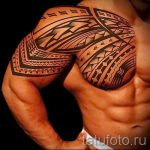 tatuaż dla facetów na ramieniu - przykład zdjęcia 2