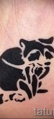 Татуировка на миеща мечка - снимка на готовата татуировка за материала за стойността на 19