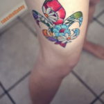 fotó egy tetoválásról, flur-de-lis-vel 2019.12.14 №137 -heraldic liliom-