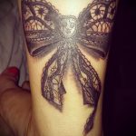 csipke íj tetoválás - fotó példa a kész tetoválásra 11