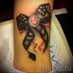 csipke íj tetoválás - fotó példa a kész tetoválásra 12