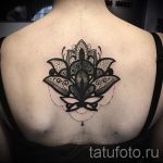 dentelle tatouage sur son dos - például a Photo du tatouage fini 1