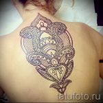 csipke tetoválás a hátán - Fotó példa a kész tetoválásra 2