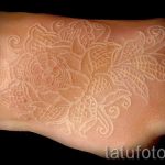 fehér csipke tetoválás - fotó példa a kész tetoválásra 1