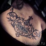 csipketetoválás a hát alsó részén - fotó példa a kész tetoválásra 2