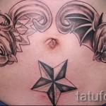 татуировка на лястовица по корем - пример за снимка 12