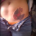 татуировка на лястовица по корем - пример за снимка 34