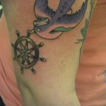 татуировка на лястовица на крака - пример за снимка 13