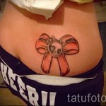 татуировки с лък на бедрата - примери за готови татуировки на снимки 01022016 7
