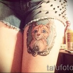 котешка татуировка на бедрото 2