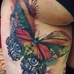 акварелна татуировка на бедрото 3