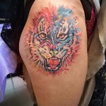 татуировка тигър на бедрото 3