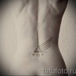 farokcsont tetoválás - fényképes példa egy kész tetoválásra a testen 10