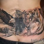 farokcsont tetoválás - fényképes példa egy kész tetoválásra a testen 15