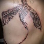 Főnix tetoválás a lapockán